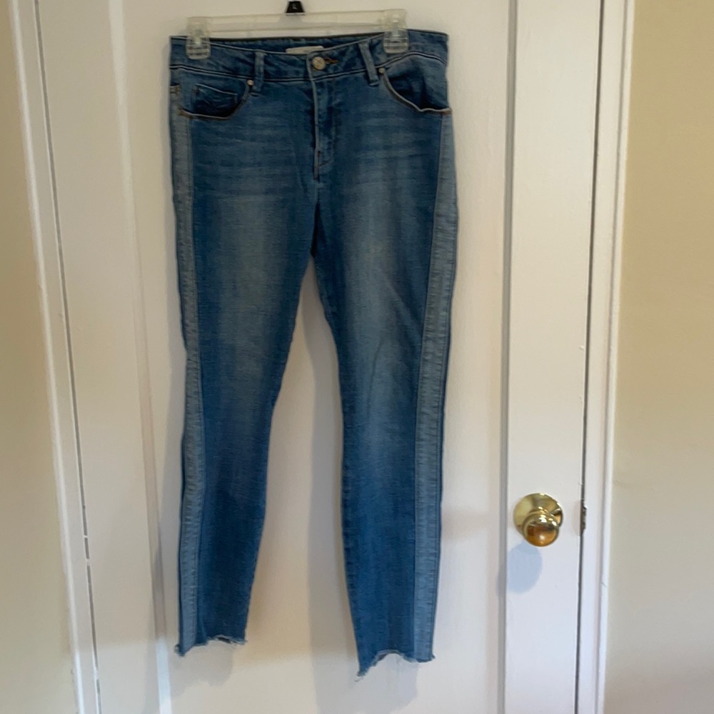 Blue jeans with lighter denim pattern on side